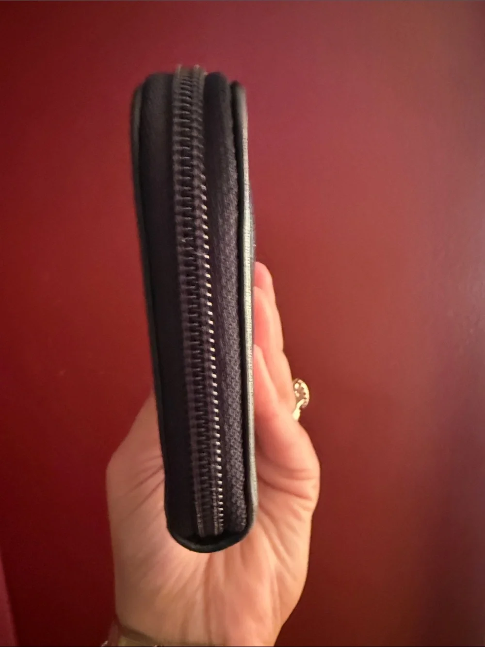 CHANEL Black Quilted Zip Wallet with CC Hardware
